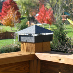 Smooth black wrinkle lighted post cap / deck light.