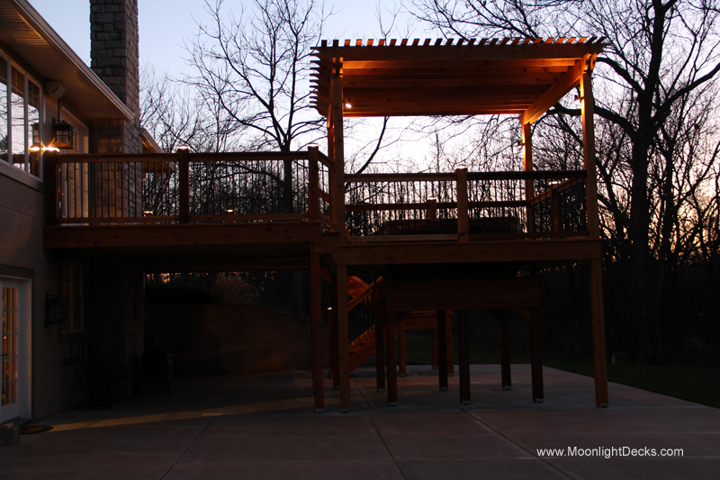 Deck lighting with low voltage lighted post caps / deck lights.
