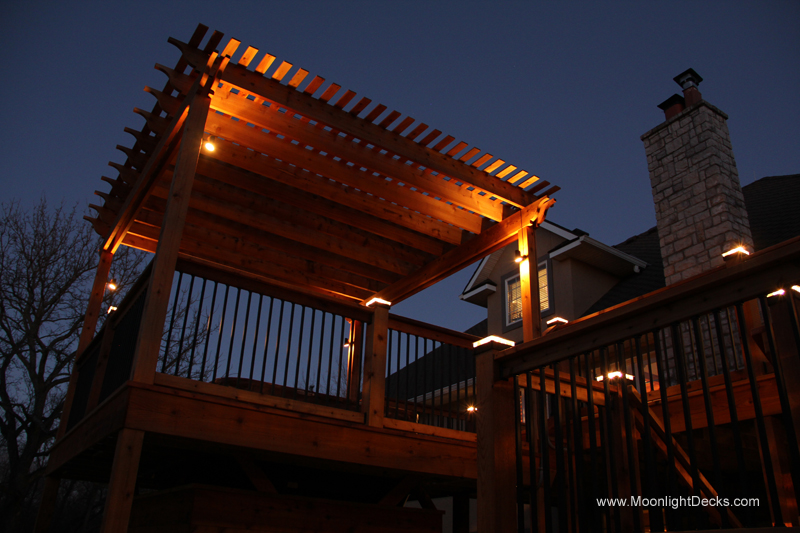 Deck lighting with low voltage lighted post caps / deck lights.