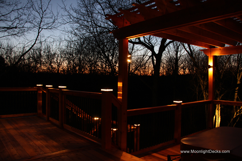 Deck lighting with low voltage lighted post caps / deck lights.