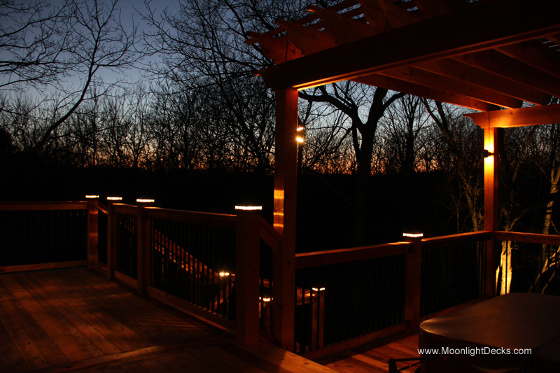 Deck lighting with low voltage lighted post caps / deck lights.