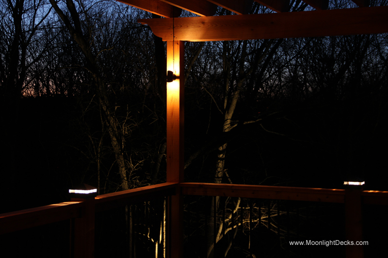 Deck lighting with low voltage lighted post caps / deck lights.
