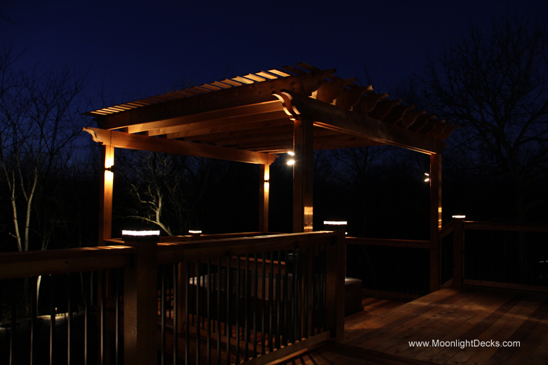 Deck lighting with low voltage lighted post caps / deck lights.