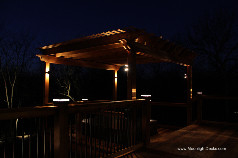 Deck lighting with low voltage lighted post caps / deck lights.