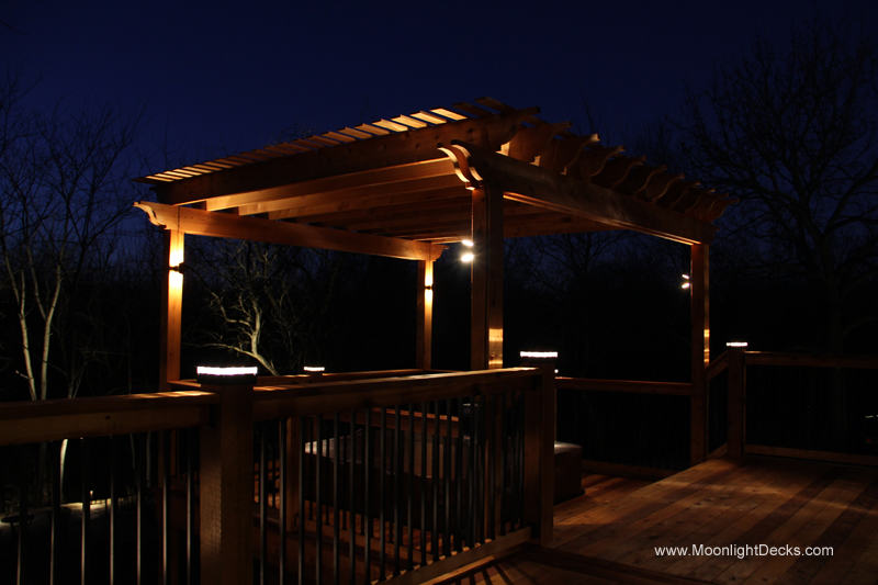 Deck lighting with low voltage lighted post caps / deck lights.