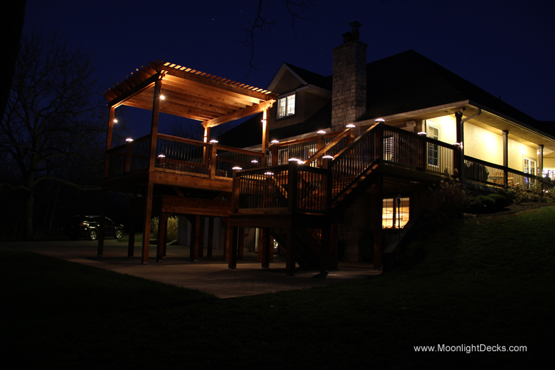 Deck lighting with low voltage lighted post caps / deck lights.