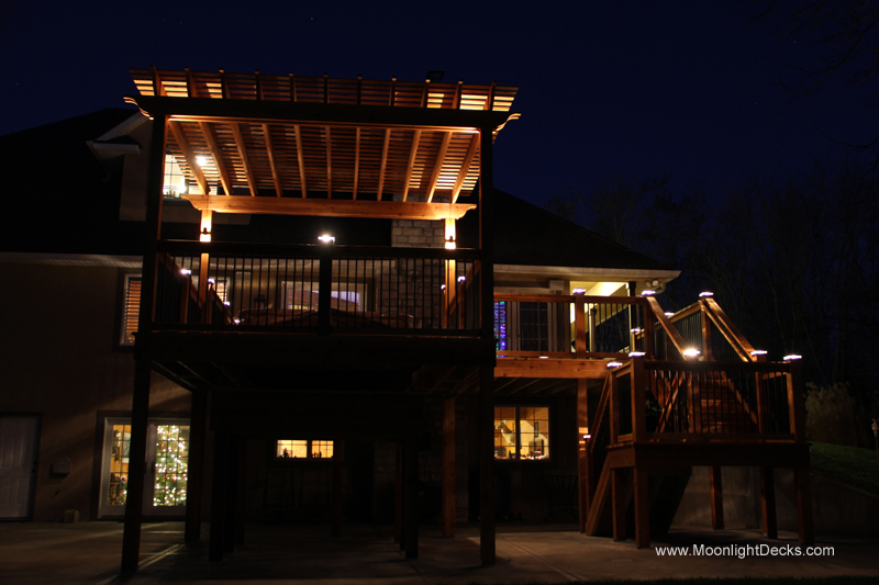 Deck lighting with low voltage lighted post caps / deck lights.