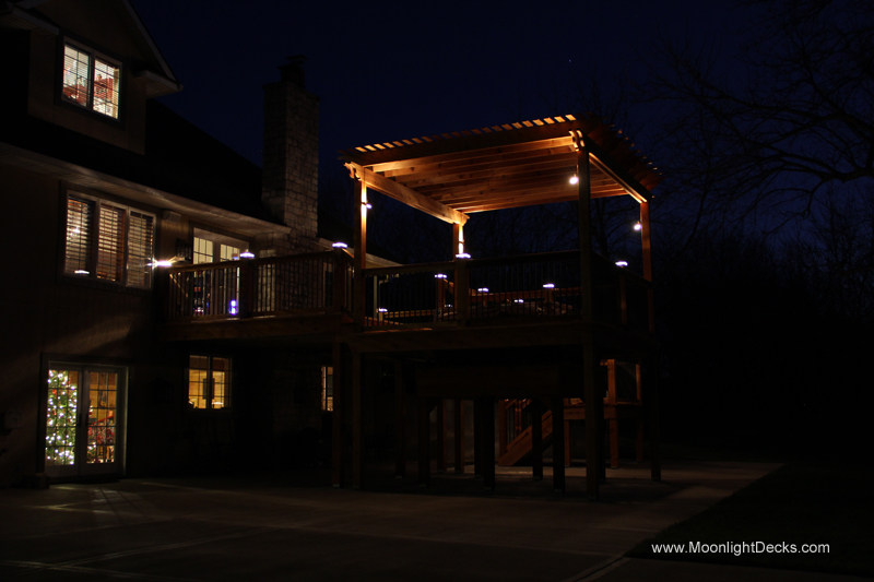 Deck lighting with low voltage lighted post caps / deck lights.