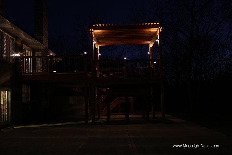 Deck lighting with low voltage lighted post caps / deck lights.