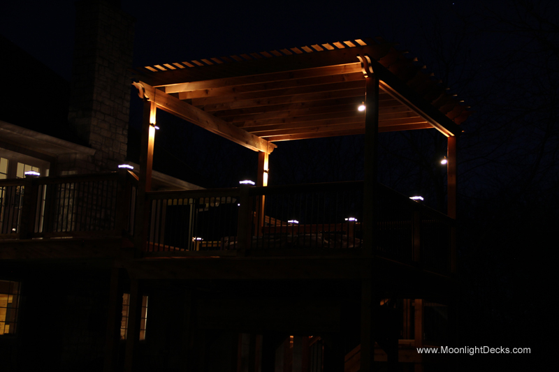 Deck lighting with low voltage lighted post caps / deck lights.